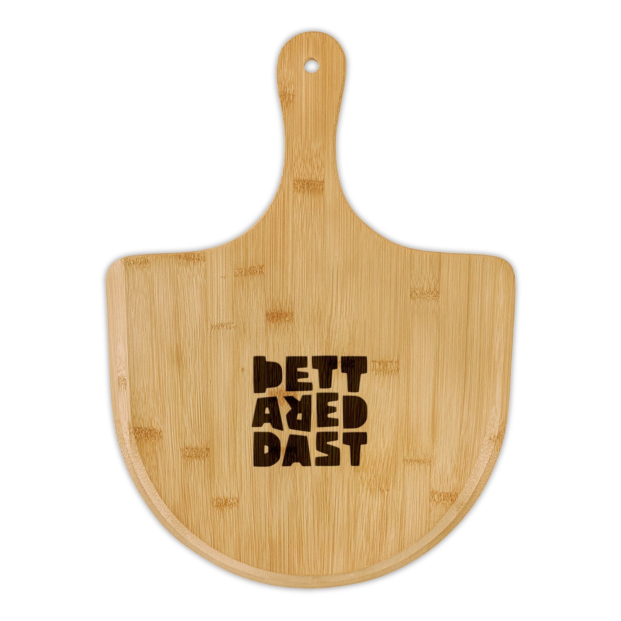 The Printify Bamboo Pizza Board (Engraving) is a natural bamboo pizza peel with a handle, featuring "BETTERED BAST" engraved in block letters.