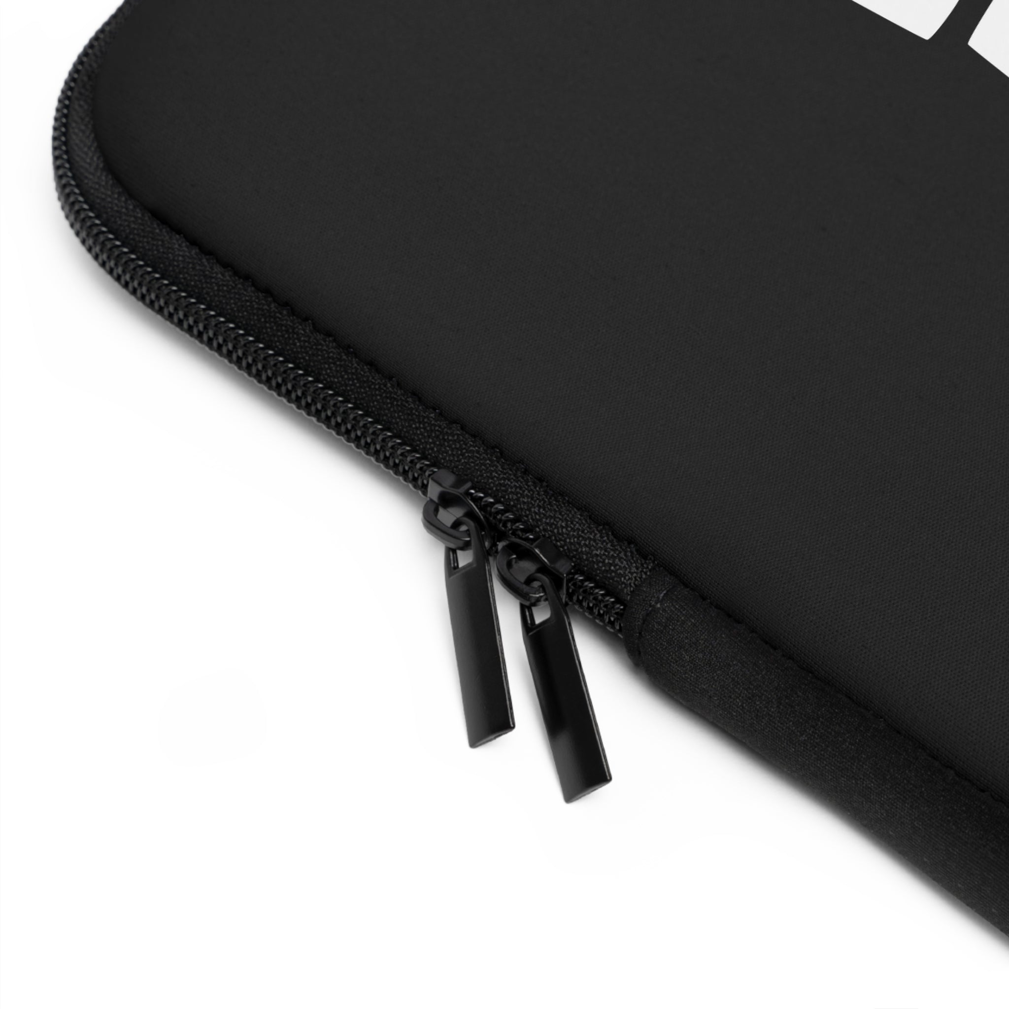 Close-up of the Printify Copy of Copy of Laptop Sleeve, a black, water-resistant case with two metal zipper pulls, shown against a white background.