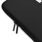 Close-up of the Printify Laptop Sleeve Black—a water-resistant, customizable case with two black zipper pulls—set against a white background.