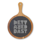 The Printify Charcuterie Board (Engraving) features a round acacia wood design with a black slate center engraved with "BETTER BREAD" in bold, blocky gray letters.
