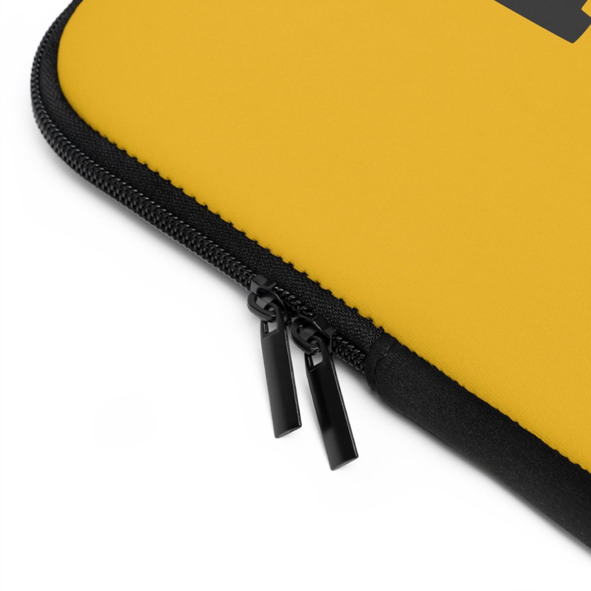 Close-up of the Printify "Copy of Laptop Sleeve" in yellow, featuring a water-resistant finish, black zipper, and two black zipper pulls, displayed on a white background.