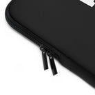 Close-up of the Printify Laptop Sleeve Black, a water resistant zippered case with two zipper pulls, shown on a white background.