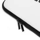 Close-up of a black zipper with two pulls on a white and black water-resistant Laptop Sleeve by Printify.